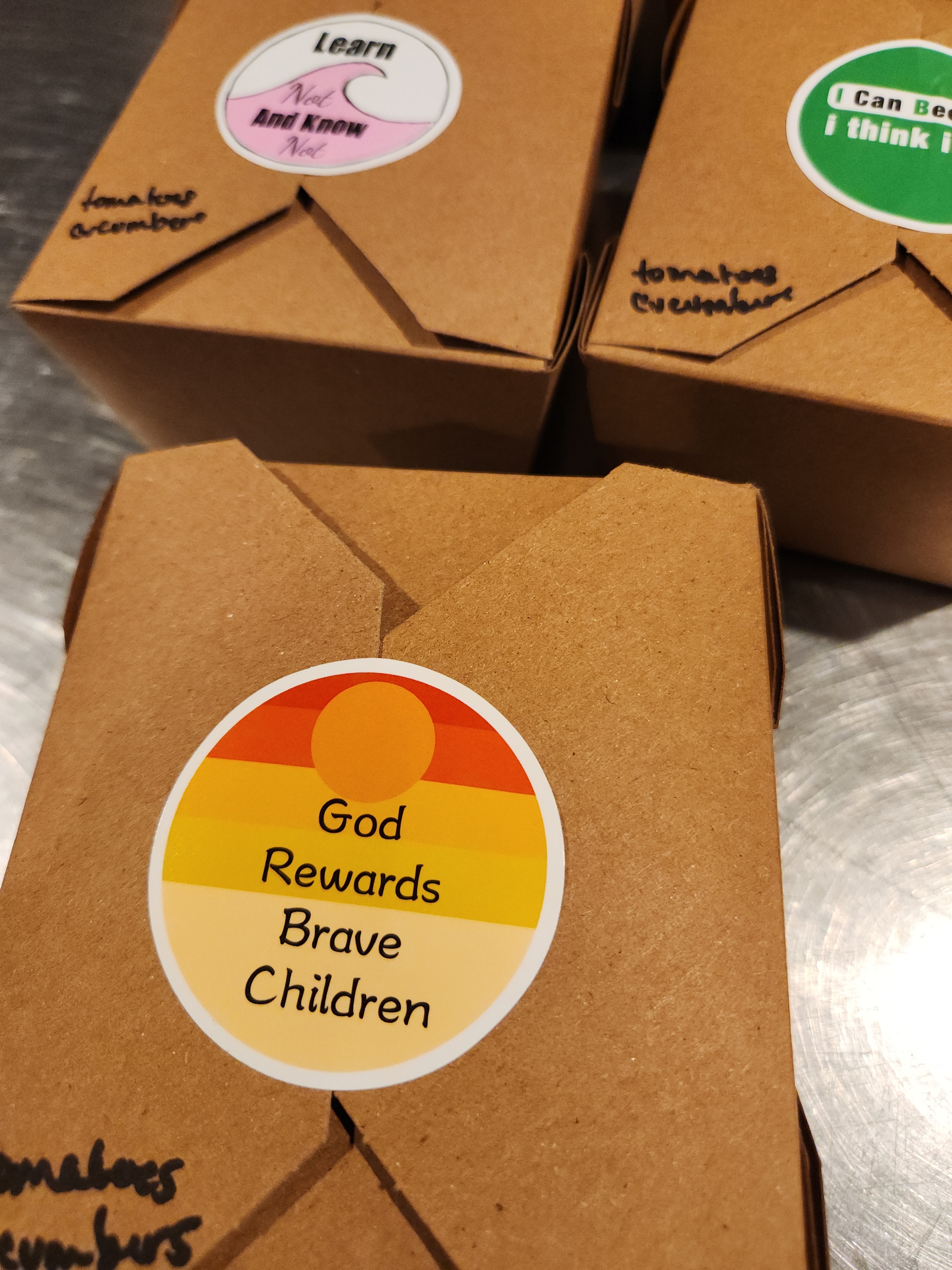 Community kitchen event with guests and volunteers