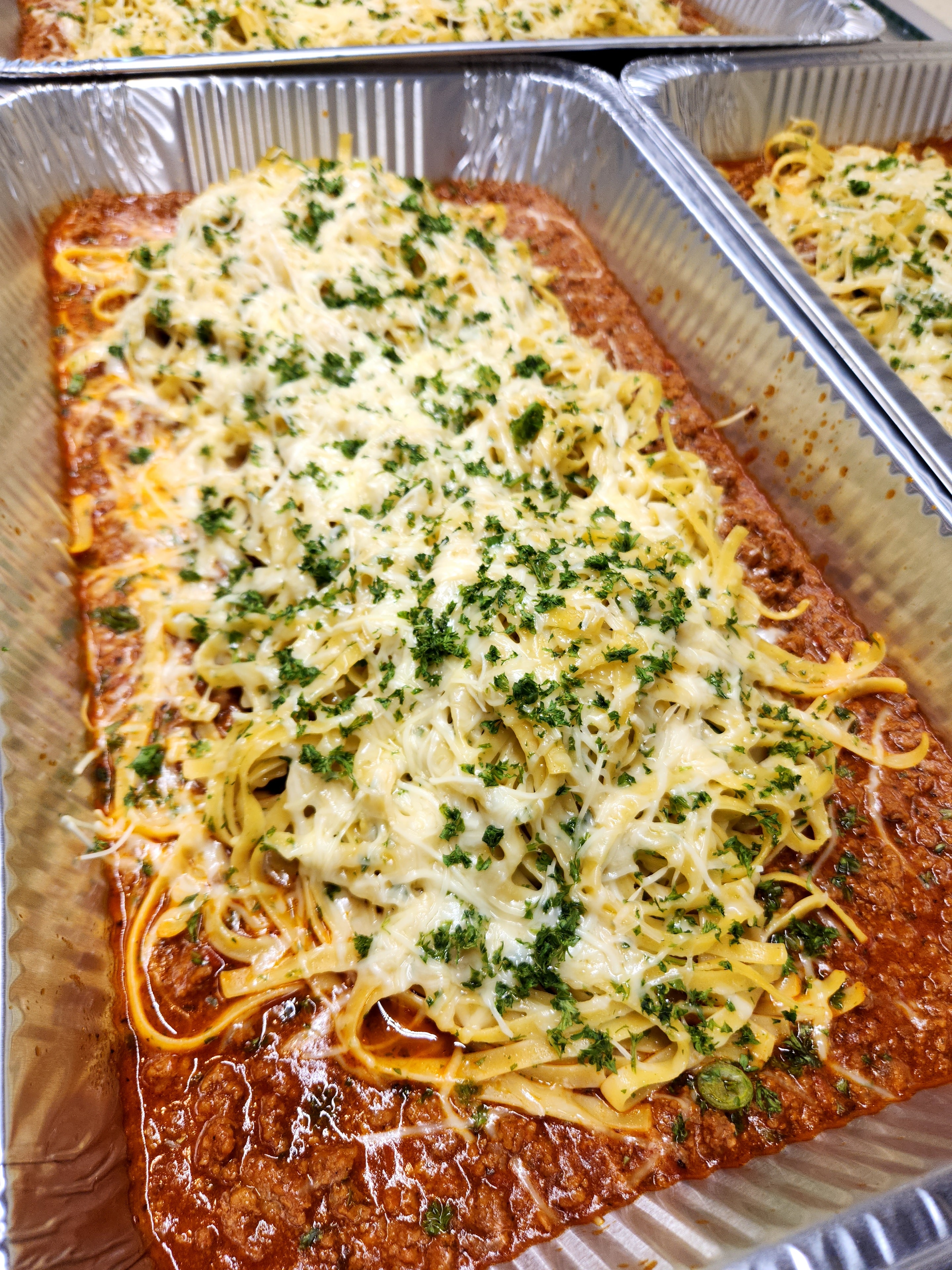 Baked pasta with cheese and herbs